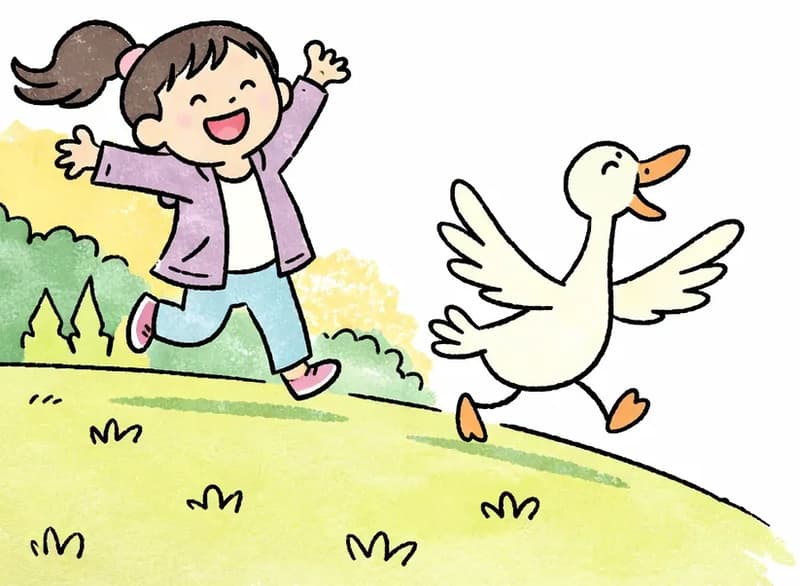 On the left side of the image, Girl is running energetically across a grassy hillside, one arm raised high and a big, excited grin on her face. Just ahead of her, Duck is sprinting forward with wings fully spread, beak open, racing alongside Girl. The outdoor scene features a gentle green slope with small tufts of grass, backed by clusters of trees and warm golden-yellow foliage, with the right side of the image opening to plain light background.