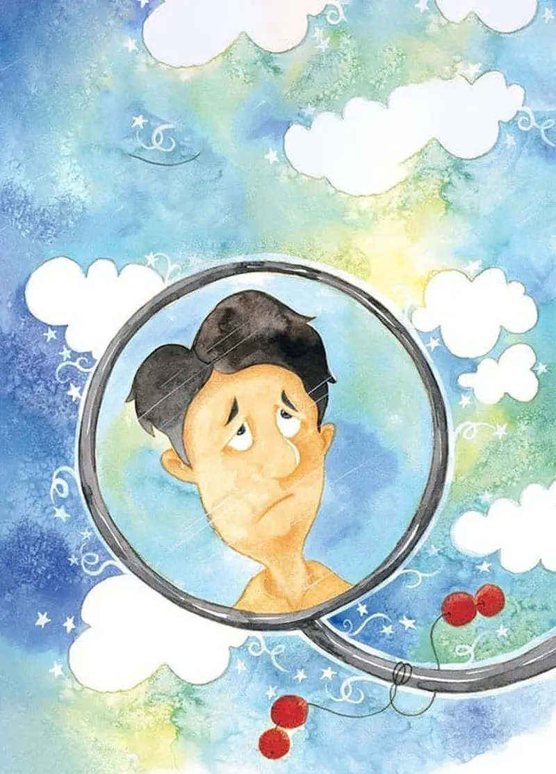 Sad man's face in circular frame floating in dreamy blue sky with white clouds and cherries