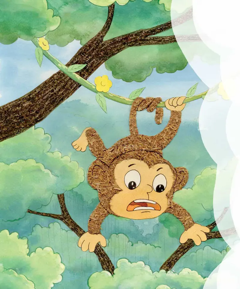 Monkey swinging from vine in treetops looking scared