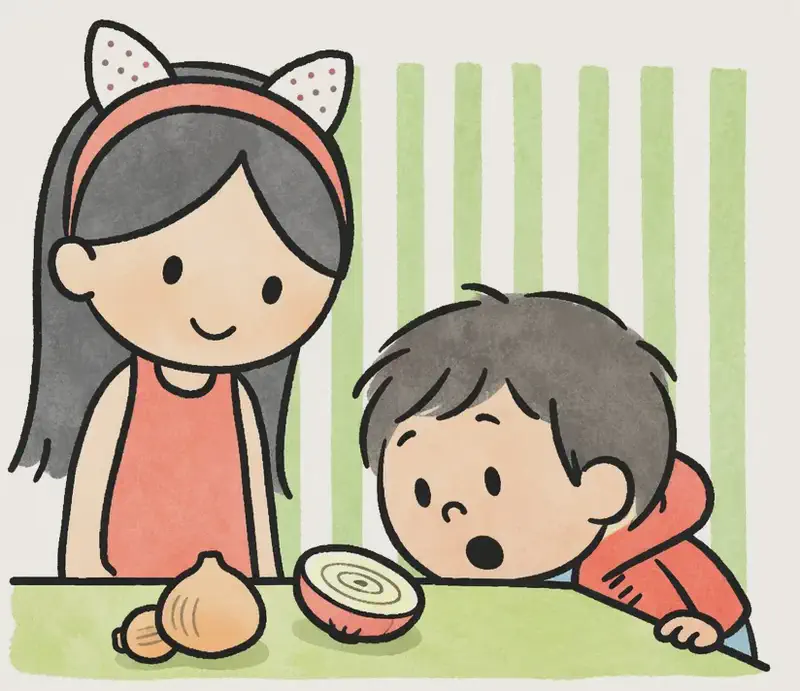 On the right side of the image, Big Sis stands behind a kitchen counter with a gentle, knowing smile, looking down at a halved onion on the counter. Little Brother leans in from the right, peering closely at the cut onion with a surprised, open-mouthed expression, his face near the counter surface. A whole onion and its sliced half sit on the green countertop, with green-striped wallpaper in the background indicating an indoor kitchen setting. The left side of the image is plain white background.