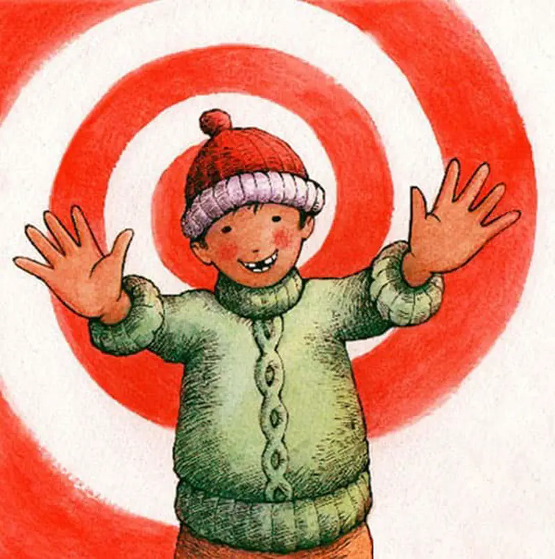 A happy child in a red beanie and green sweater holds up both hands showing ten fingers against a red spiral background.