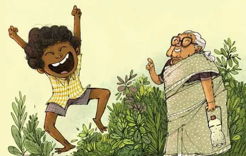 A joyful boy jumps with arms raised in a garden while his grandmother with glasses smiles and points at the plants.