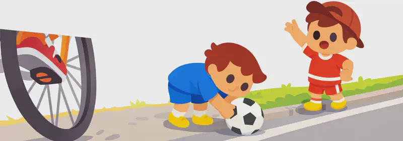 On the right side of the image, Fafa is bent over on the road reaching down to grab a soccer ball, head lowered and unaware of his surroundings, wearing a blue short-sleeved soccer jersey, blue shorts, white socks, and yellow cleats. Jojo stands further to the right at the roadside, one arm raised, calling out to Fafa with an alarmed expression, wearing a red short-sleeve shirt, red shorts with white horizontal stripes, a dark reddish-brown baseball cap worn backwards, white socks, and yellow shoes. A large bicycle wheel looms dramatically in the left-center foreground, speeding toward Fafa, conveying imminent danger. The scene is set on a suburban road with a narrow grass curb separating the sidewalk from the street, under bright daylight.