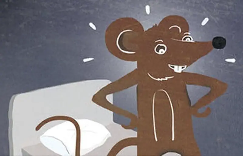 The brown mouse stands confidently with hands on hips beside the bed, smiling and unafraid of the ghost.