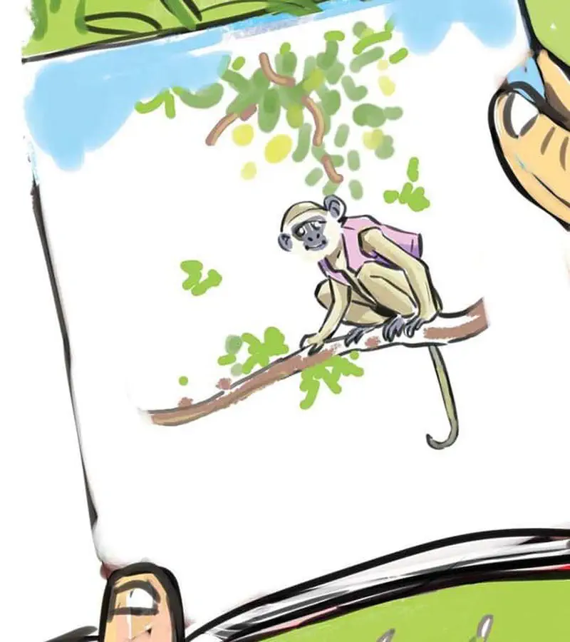 A monkey in a pink vest sits on a tree branch, shown on a book page with Kojo's hands visible below.