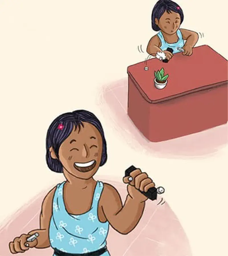 A happy girl experiments with objects sticking to a black magnet. She holds a bottle cap in one hand and the magnet-pen combo in another.