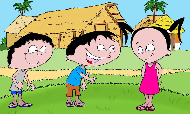 Three smiling children with black hair standing in front of thatched huts and palm trees in village.