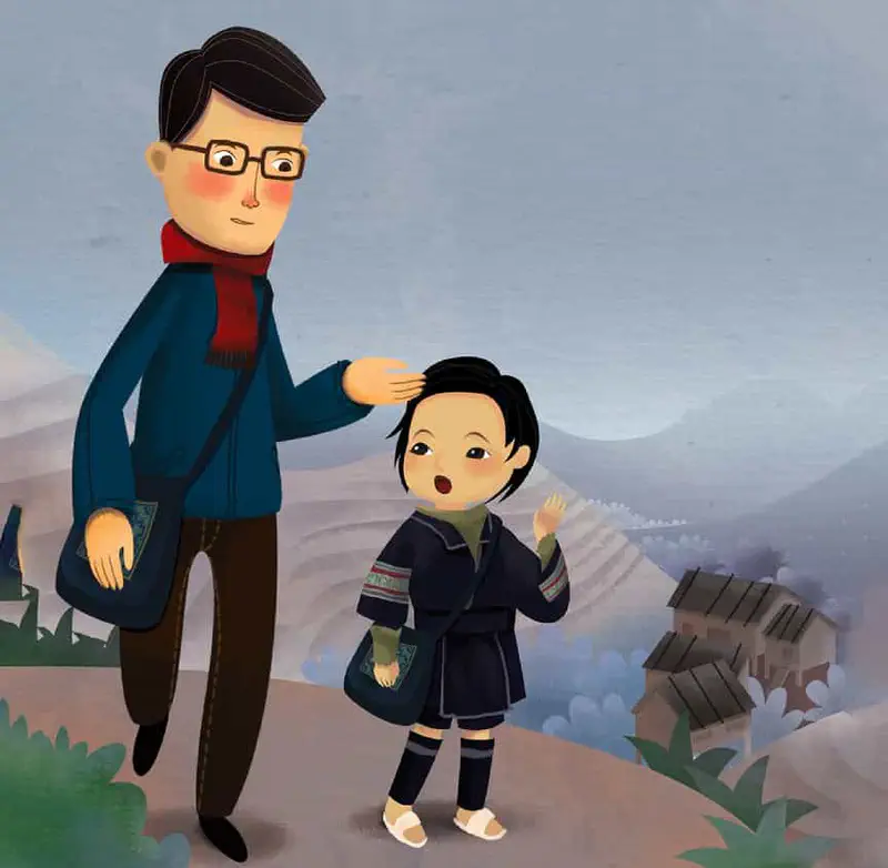 Father patting daughter's head as they walk together on path with traditional house in background.