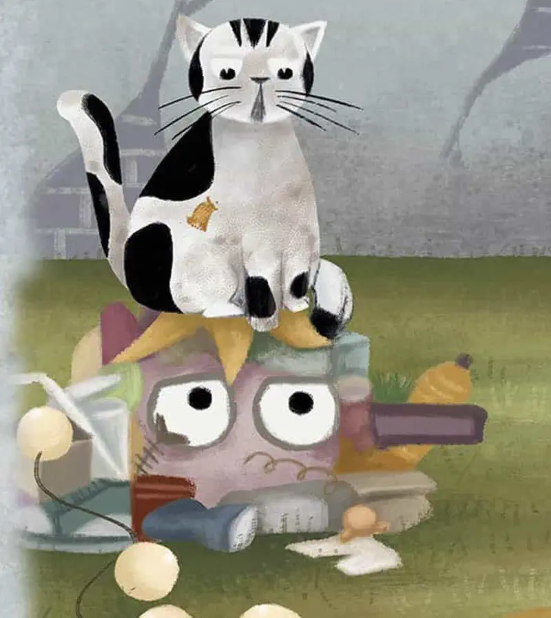 Cat sitting proudly on sad pink trash monster surrounded by colorful scattered junk.