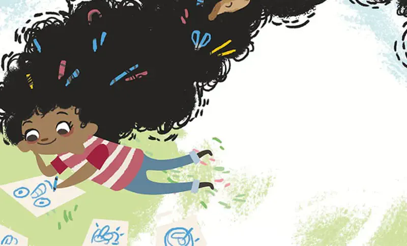 Girl lying on grass drawing with crayons tucked in her sprawling curly hair, dog peeking out.