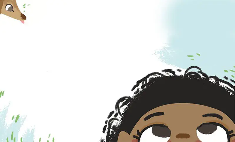 Top of girl's curly black hair visible with dog peeking from corner in grassy scene.