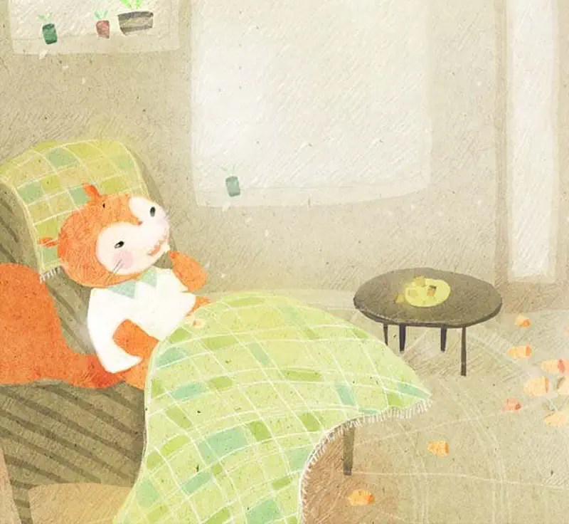 Orange squirrel cozy under green checkered blanket in armchair looking at table with fallen leaves.