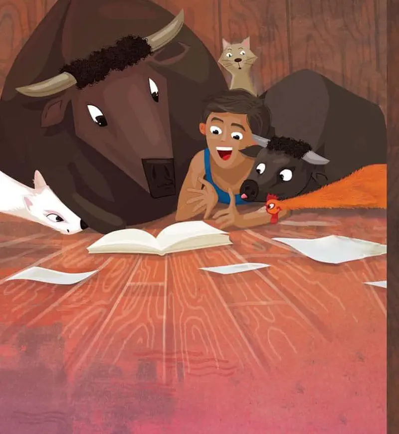 A boy reads an open book on the floor surrounded by his animal friends - water buffalo, goat, small buffalo calf, cat, and rooster - in a cozy barn setting.