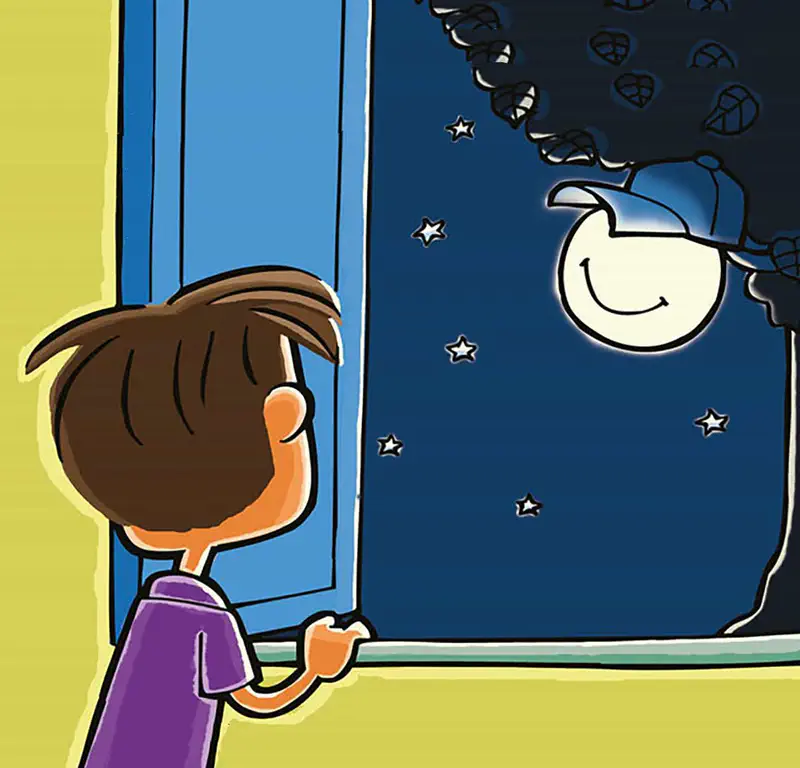 A boy in purple pajamas looks out a window at night, seeing the smiling moon wearing a cap among the stars.