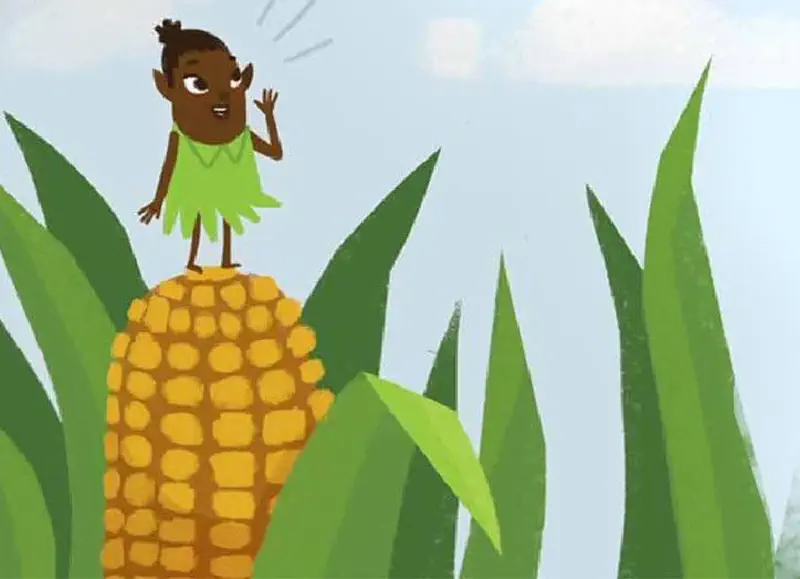 A girl smiles with eyes closed hugging a tiny elf close to her chest in a gentle embrace.