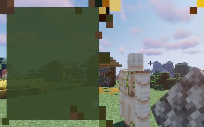 Jack throws stones at the iron golem near a village building, trying to get it to move in the Minecraft world.