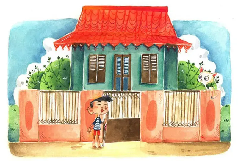 A boy with a white cane stands outside a teal house with a red roof and coral fence, a cat peeking from behind.