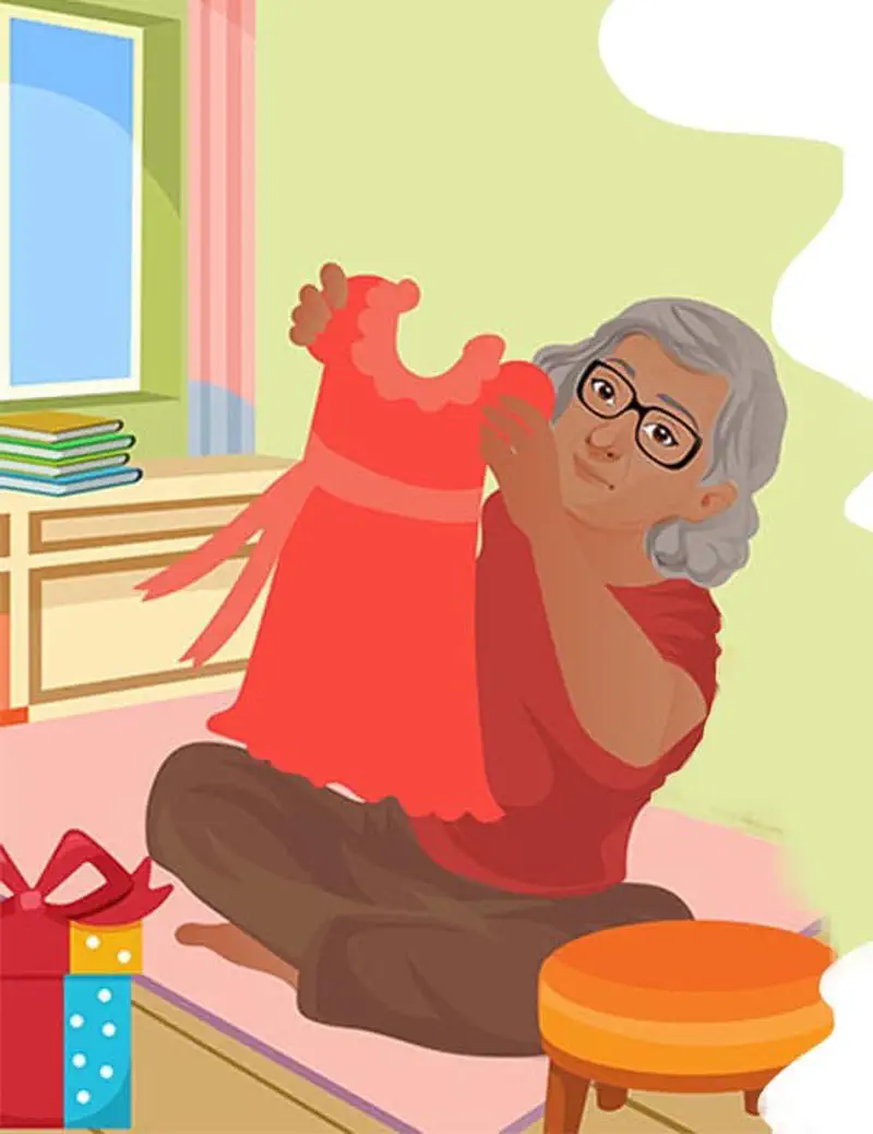 A grandmother with glasses holds up a pretty red dress while sitting on a bed with a wrapped gift beside her.