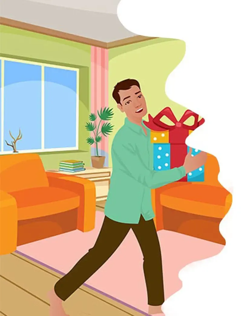 A man carries a stack of wrapped birthday presents through a living room with orange furniture and green walls.