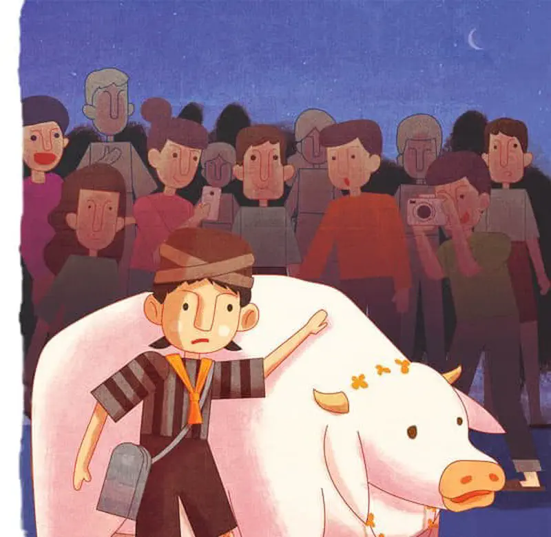 A worried boy in traditional clothing stands protectively beside his flower-decorated white calf as a curious crowd gathers around taking photos at night.